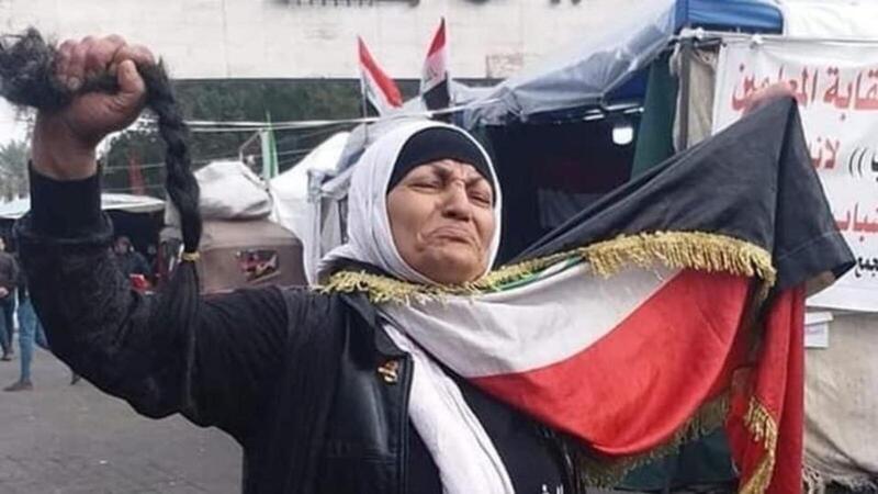 Iraqi Woman Cuts Her Hair off to Protest Killing of Demonstrators | Al